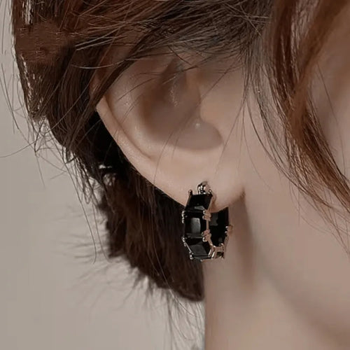Gold-plated geometric U-shaped earrings with round black zircon crystal stones