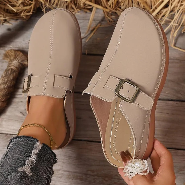 Women's casual wedge slipper in light brown with cloth upper and rubber sole