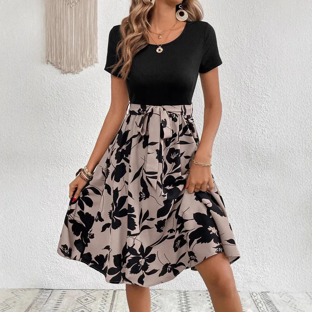 Women's khaki A-line casual dress with floral printing and lace-up front detail.
