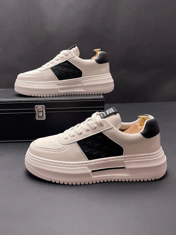 Casual unisex shoes in white with black or green accents, cloth upper with rubber foam sole