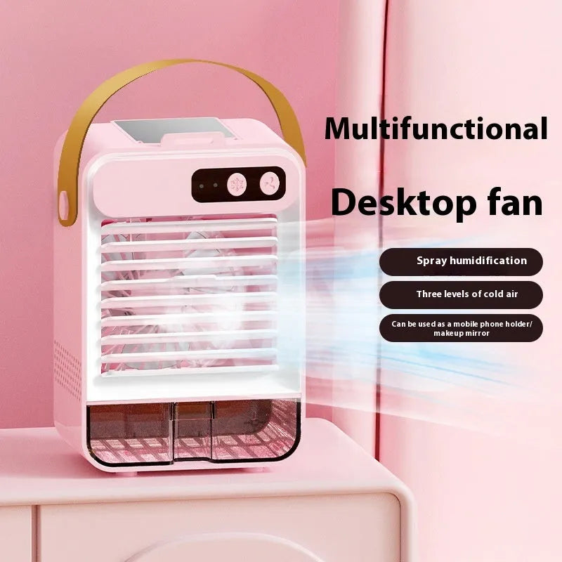 A compact dark green desktop humidifier with USB port on a wooden desk.