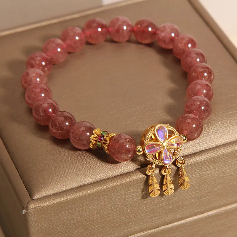Women's strawberry quartz bracelet with four-leaf clover dream catcher pendant