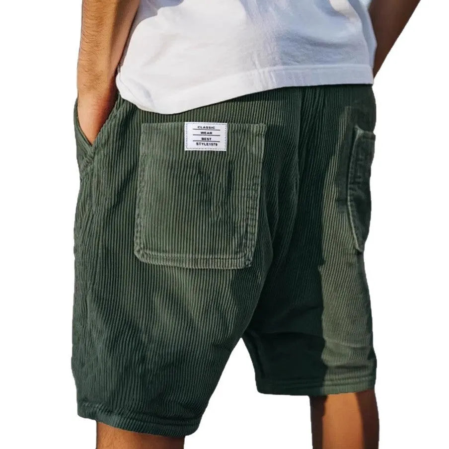 Men's grey straight-leg corduroy shorts with multiple pockets and embroidery detail on a hanger.