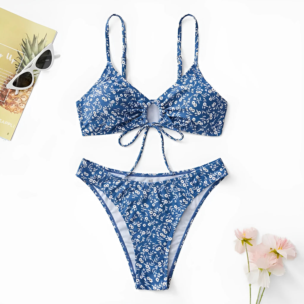 Blue polyester three-piece women's swimsuit set with top and shorts