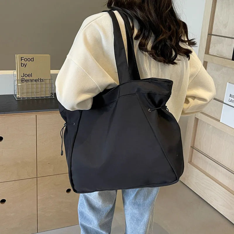 Soft Oxford cloth folding shoulder tote bag in street trend style with shoulder strap