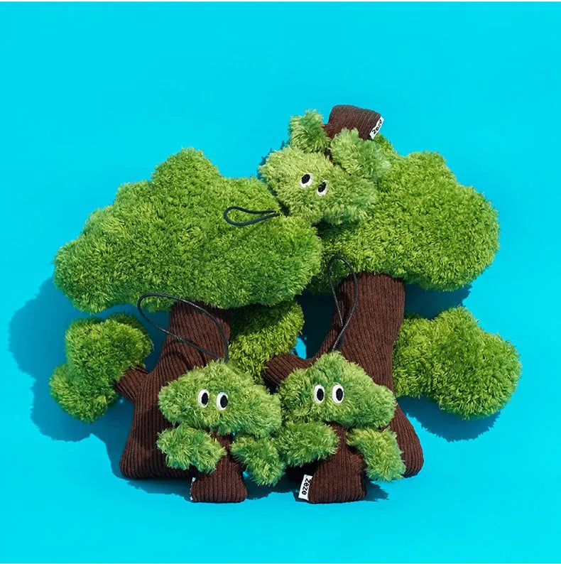 Green pine tree shaped cat toy with hanging loop for biting and interactive play