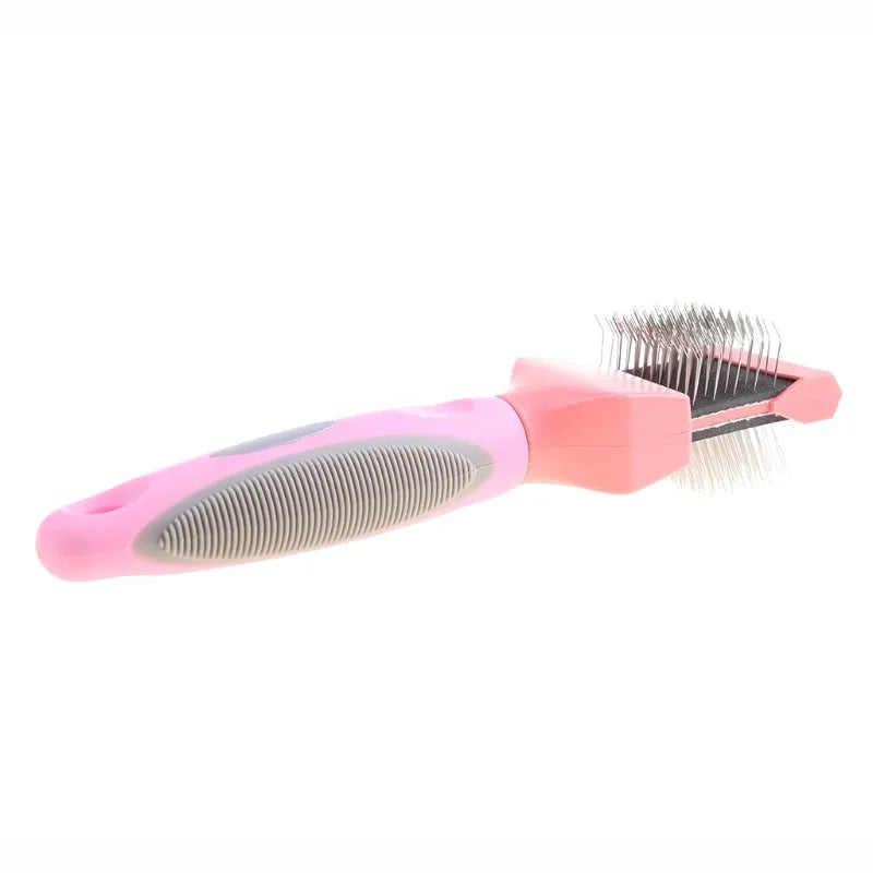 Blue double-sided pet brush with stainless steel pins and ergonomic handle on a white background
