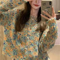 Retro slim fit pink knitted cardigan with regular sleeves on a hanger