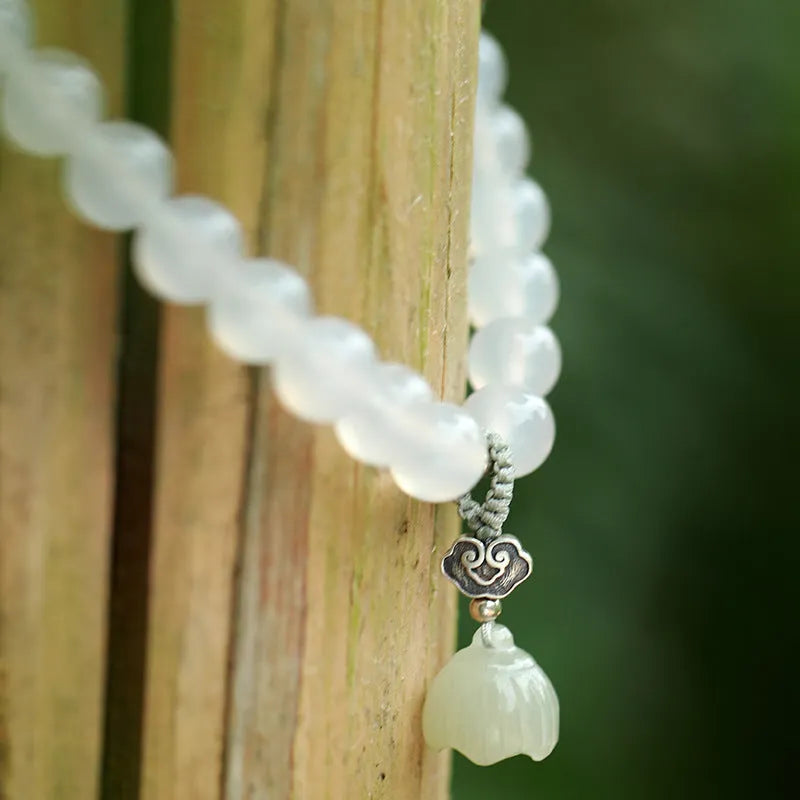 Women's bracelet with S925 silver and white agate Hetian jade in geometric lotus design
