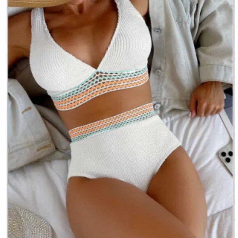 Women's high waist bikini set in solid pink colour, made from nylon fabric.