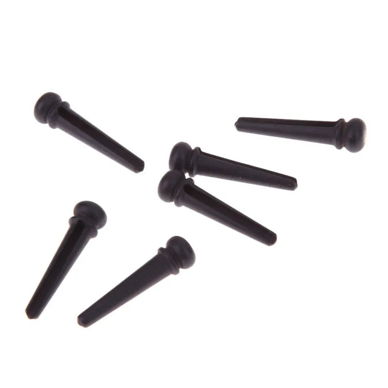Six solid ebony guitar string pins with matt black finish for folk acoustic guitars