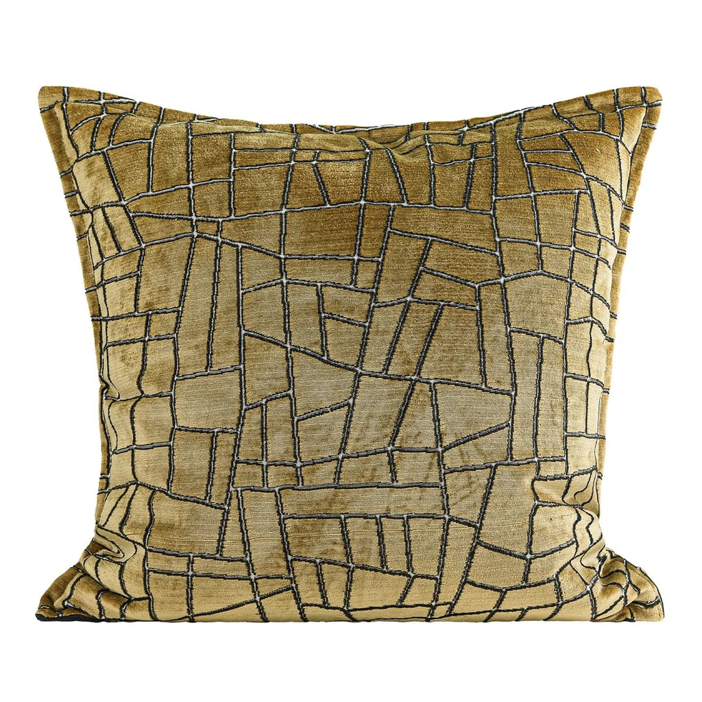 Gold geometric abstract pattern on a square polyester cushion cover with tassel detail.