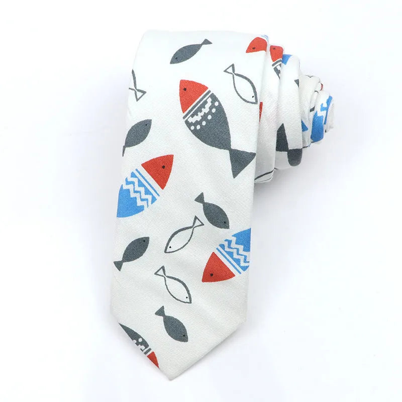 Narrow cotton bow tie with a printed cartoon pattern in a selection of colours.