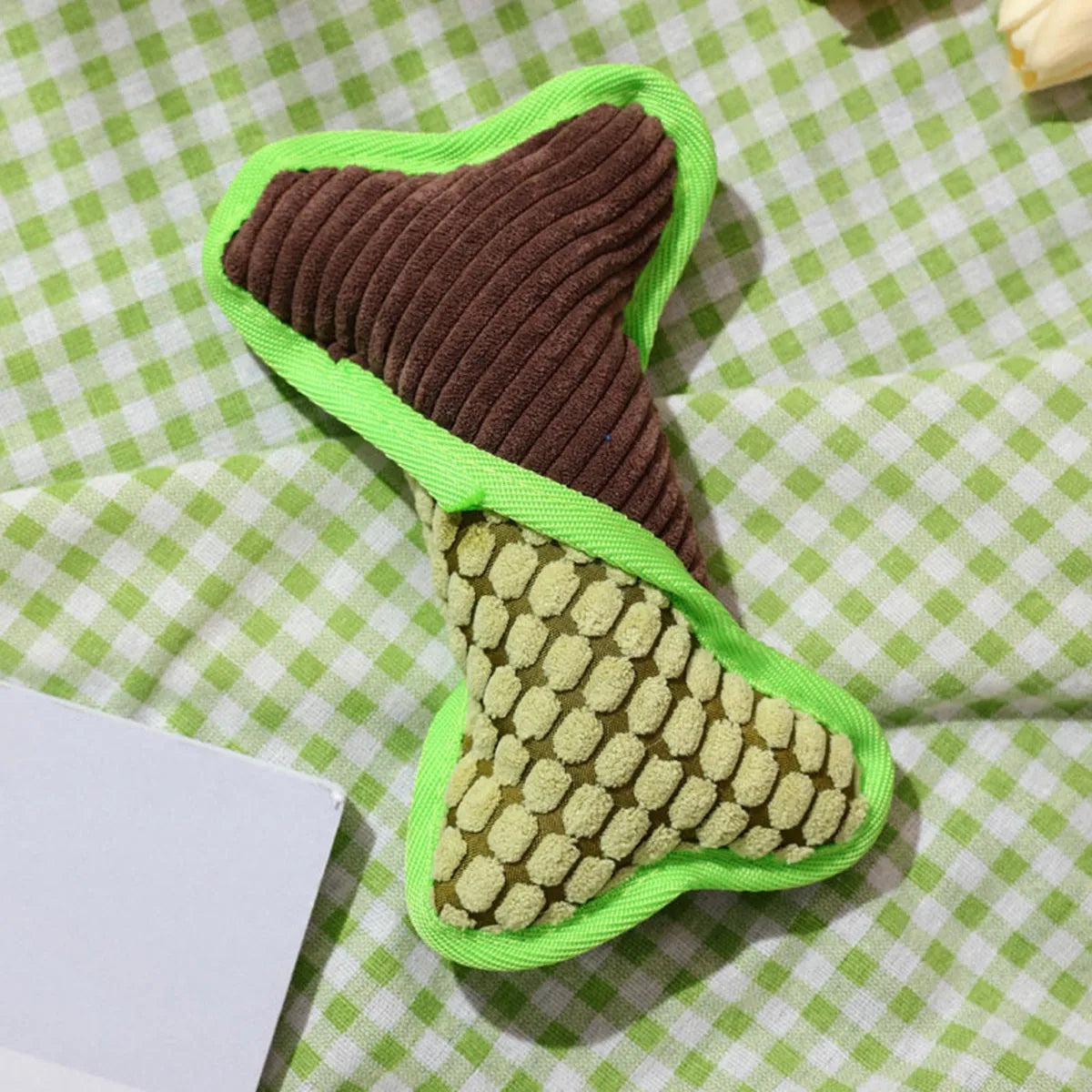 Blue teddy dog toy with sound bone model showing corn fleece lining interior