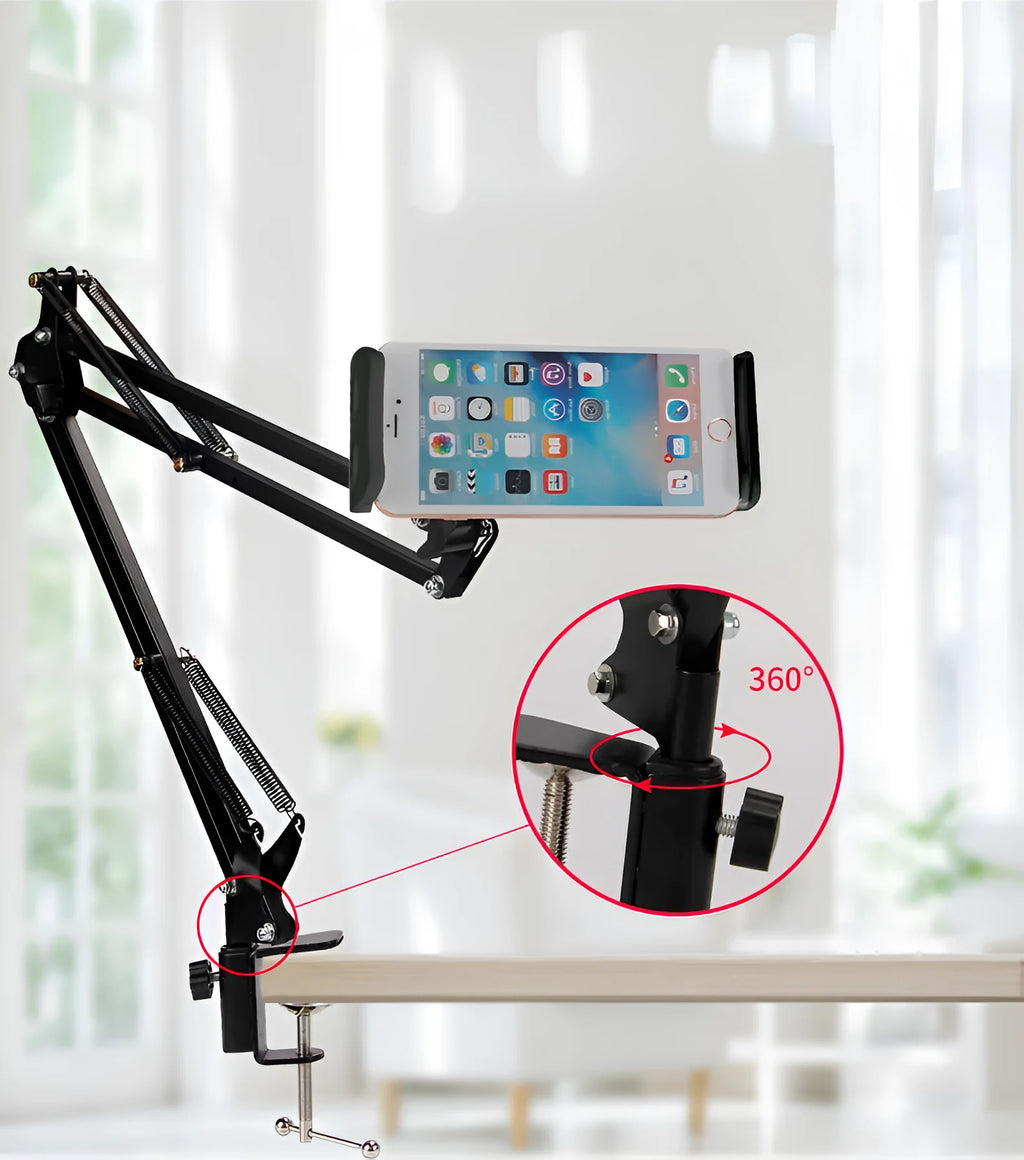 Black adjustable phone and tablet stand holding a mobile device on a desk.