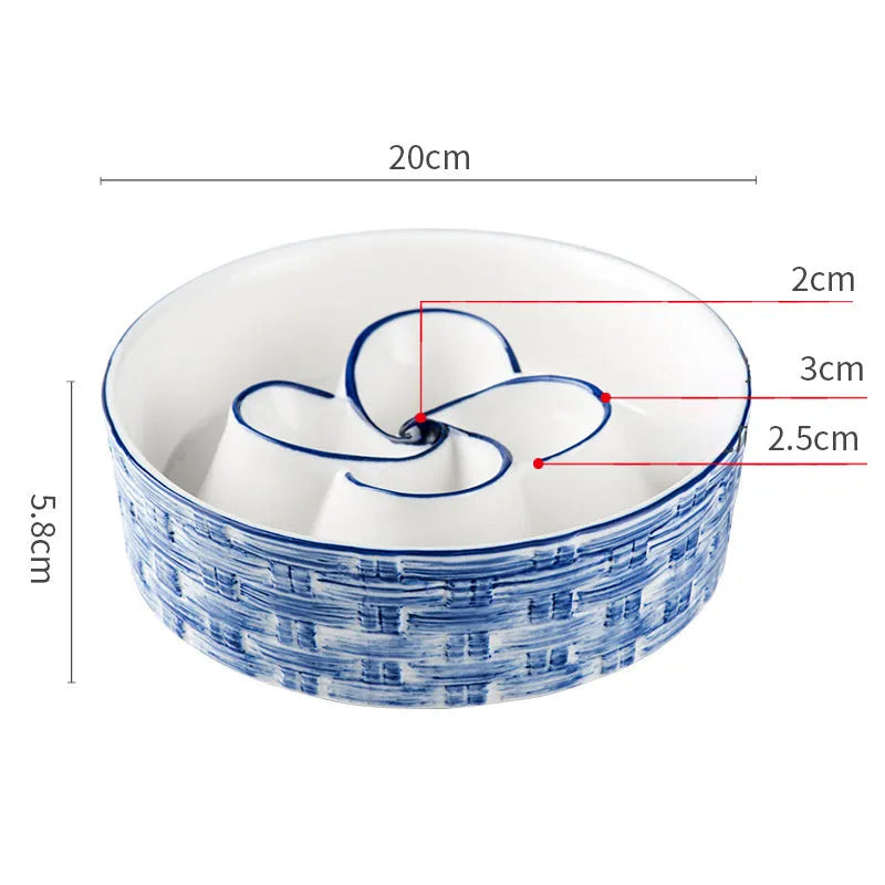 Blue ceramic slow feeder dog bowl with raised ridges for medium and large dogs on non-slip base