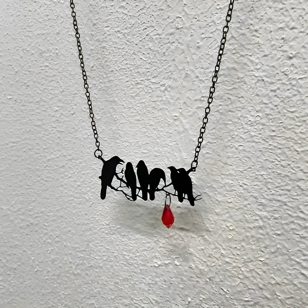 Black gothic crow necklace with detailed bird pendant on cross chain for women