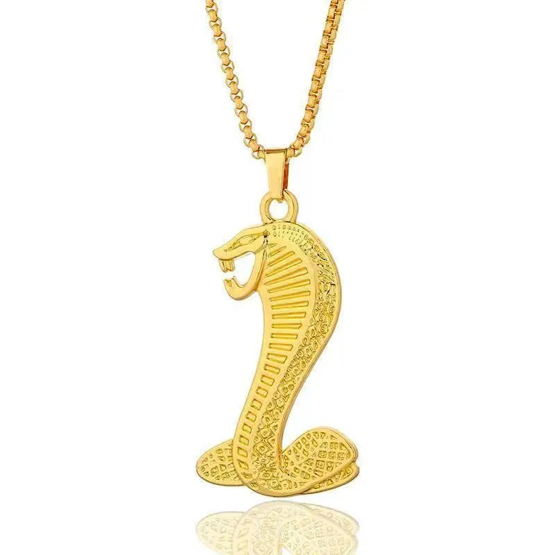 Geometric shaped gold-colour alloy pendant necklace with a sparkling zircon stone inlay on a chain.