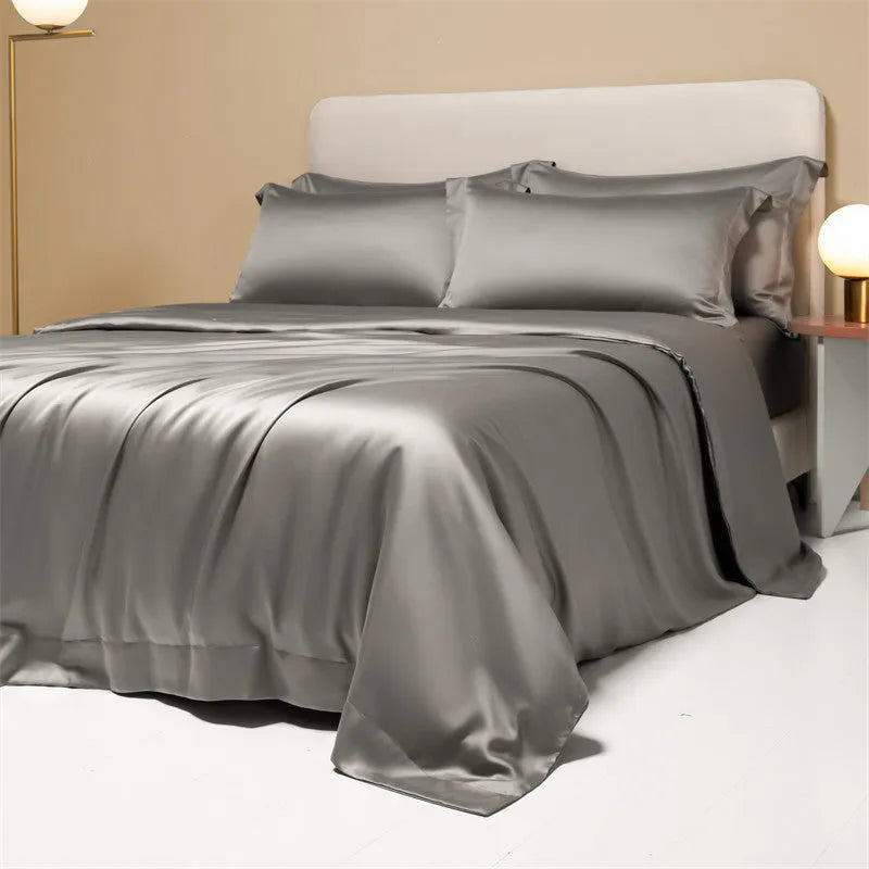 Luxury Lenzing Tencel quilt cover and pillowcase set in a modern style, showing colour options like Aurora Blue.