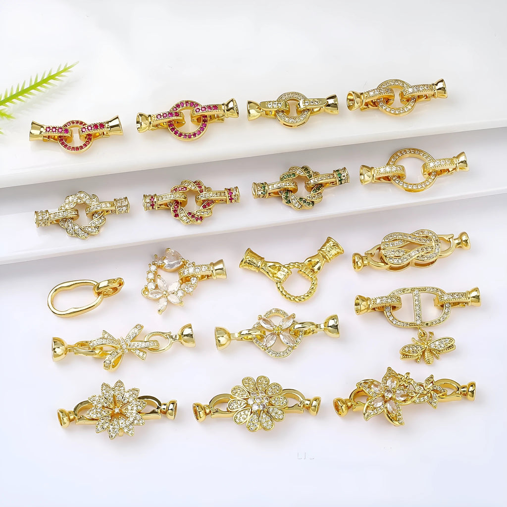 Small gold plated buckle clasp for DIY jewellery making on a white background.