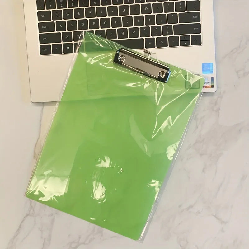 Transparent A4 clipboard with metal clip holding white paper, available in blue, green, red, and white.