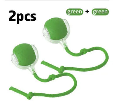 Silicone self-moving rolling ball cat toy in green, red, and grey colour options.