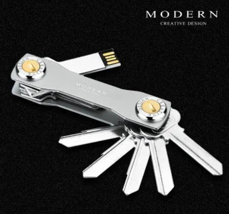 Multi-function metal keychain with stainless steel and anodised aluminium finish, featuring split ring and carabiner, in grey colour option.