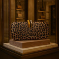 PU leather oval crossbody clutch bag with chain detail in wine red colour