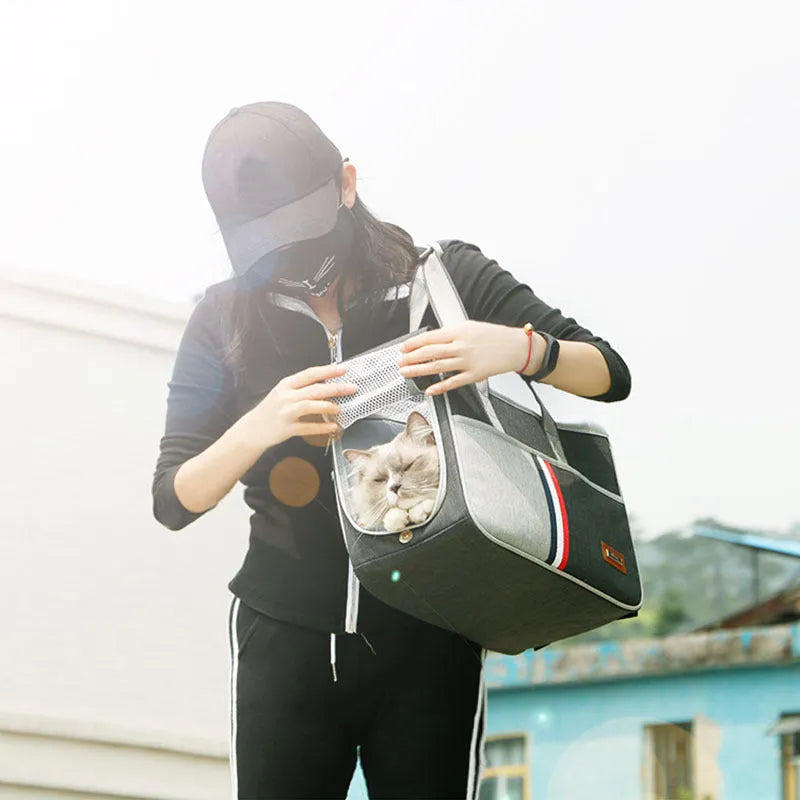 Pet shoulder bag made of matte Oxford cloth in black, for carrying cats or small dogs