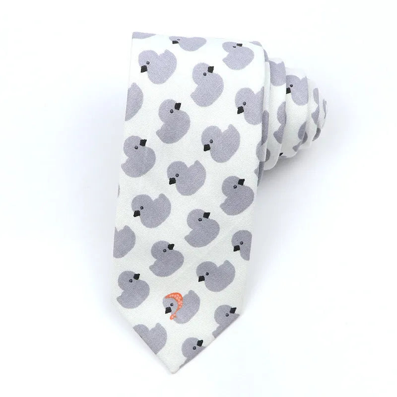 Narrow cotton bow tie with a printed cartoon pattern in a selection of colours.