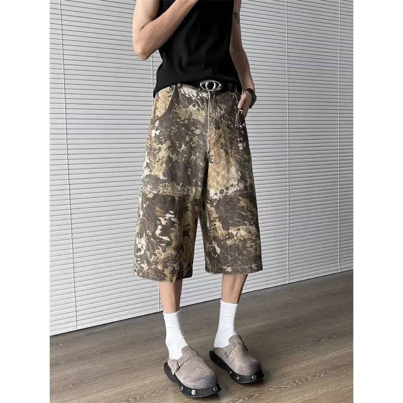 Yellow snake camouflage pattern on cropped denim jeans