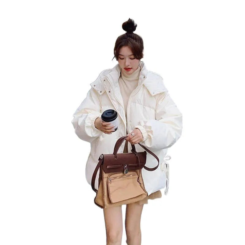 Women's loose-fit cotton-padded jacket with princess sleeves in Milky White.