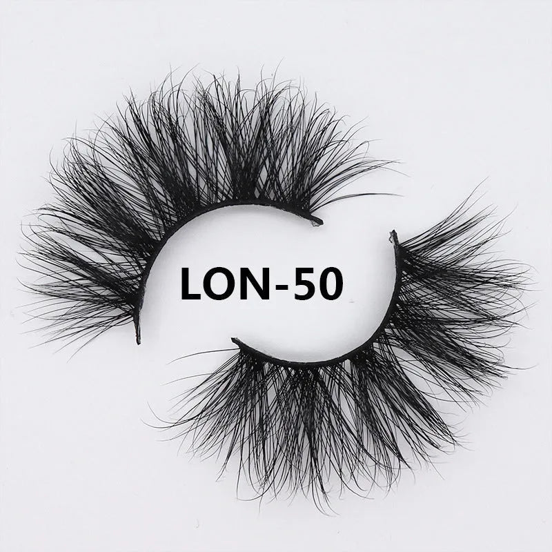 25MM3D handmade mink eyelashes in a clear plastic tray showing 25mm length 3D curl design