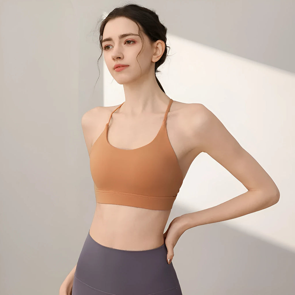 Women's nylon sports vest with fixed double shoulder straps in multiple colours on a size chart
