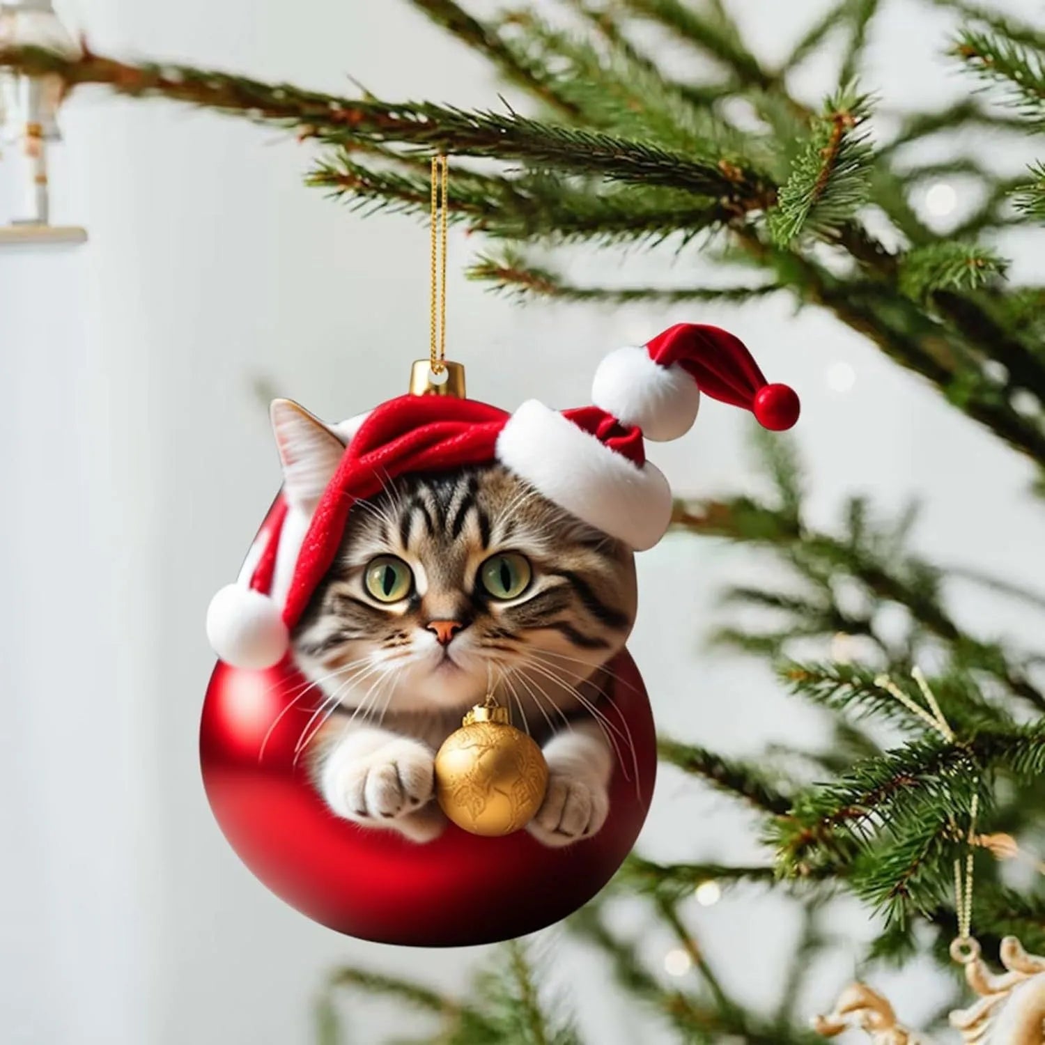 Colourful cartoon-style kitty cat Christmas ornament hanging, made from clear acrylic for car interiors.