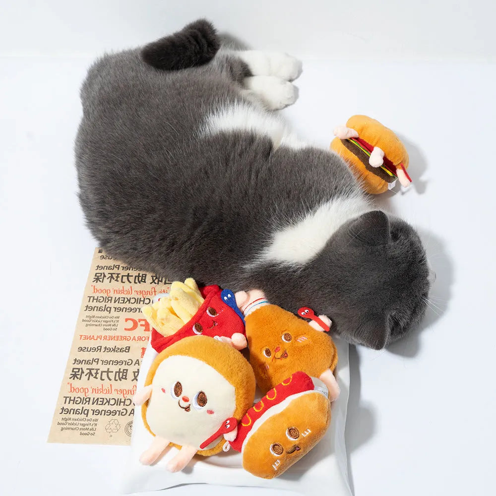 Assorted soft kitten teething toys shaped like a hamburger, chicken leg, fries, bread, and hot dog.