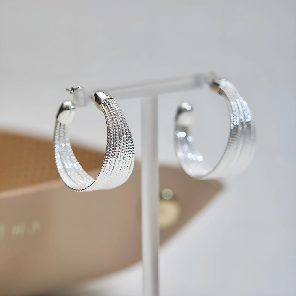Simple geometric earrings and ear clips in silver and gold colour options