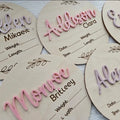 Square wooden baby name plaque with birth information display