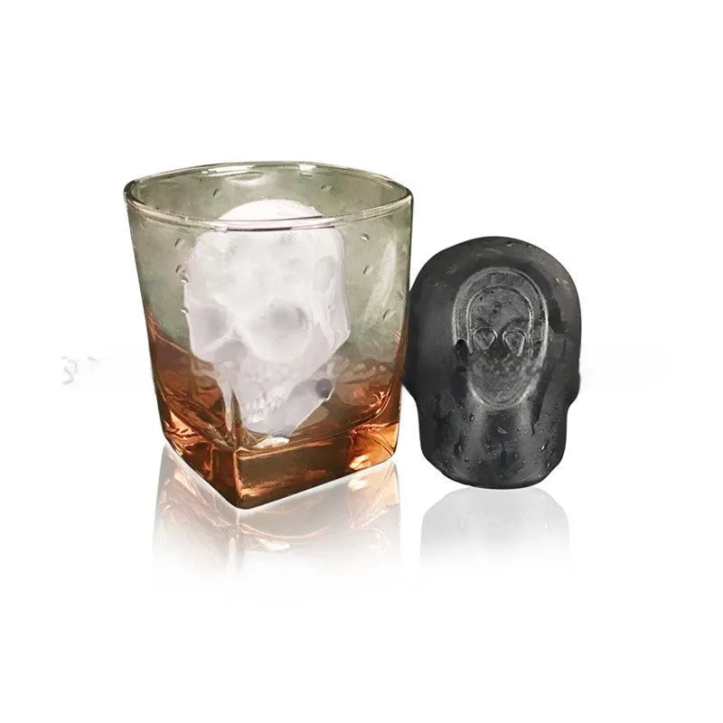 White silicone Halloween ice cube tray with detailed 3D skull mould cavities.