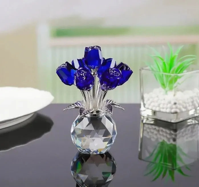 Handmade K9 crystal glass rose ornament in geometric Chinese style on a table.