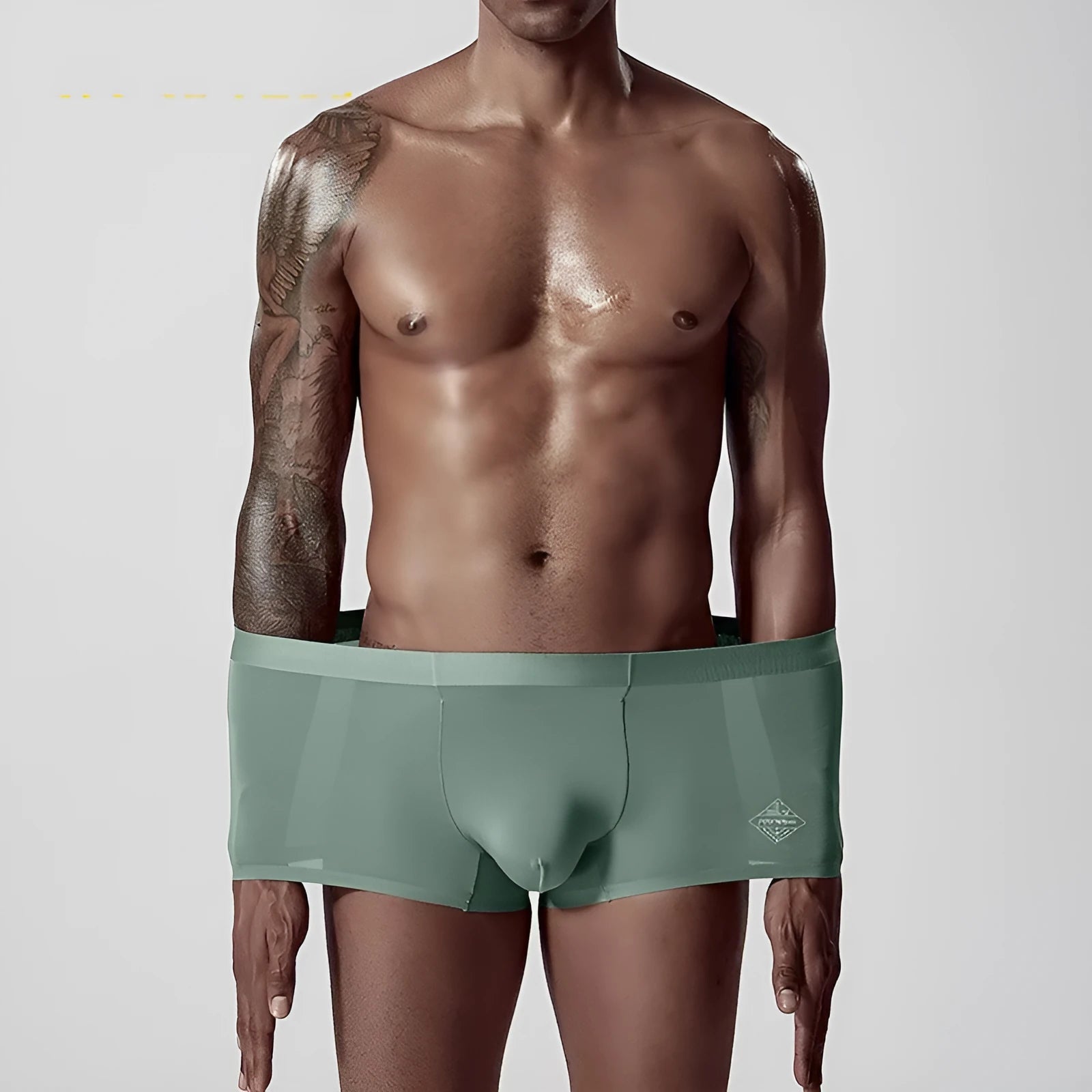Seamless one-piece men's underwear in modal fabric showing mid waist design