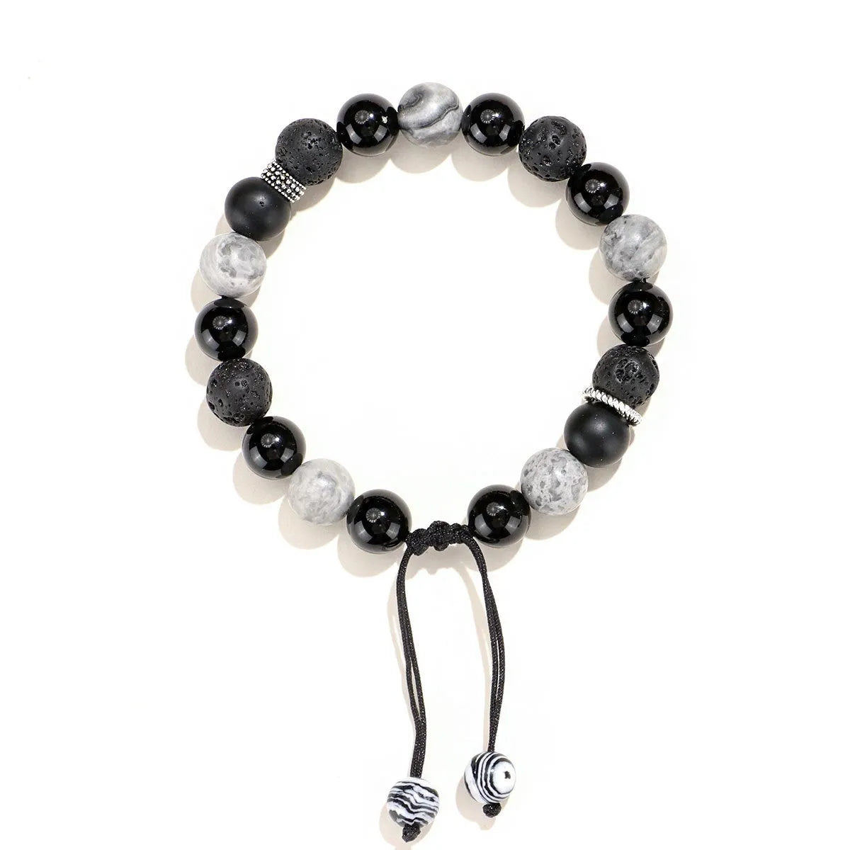 Black agate map stone volcanic rock bracelet in diamond shape, New Chinese style, on wrist.