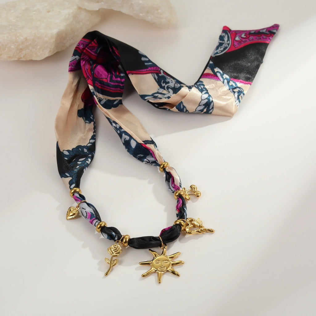 Stainless steel sun pendant necklace and bracelet set with 18K gold electroplating and geometric design
