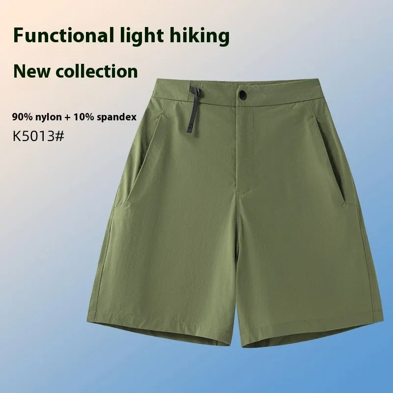 Men's solid colour quick-drying sports shorts with elastic construction, shown in khaki colour