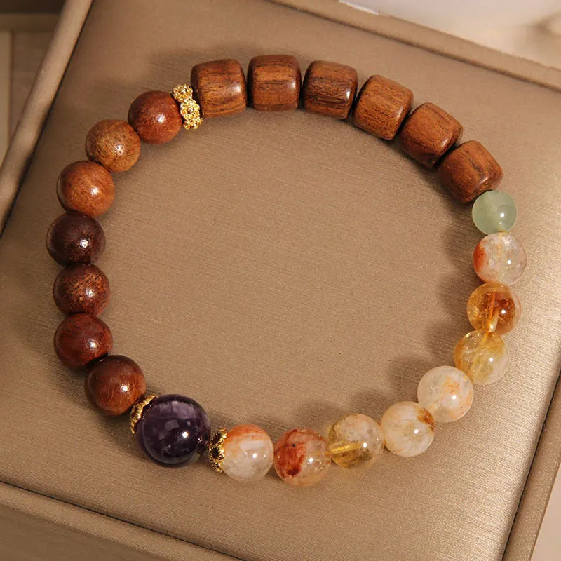 Women's bracelet with yellow tower crystal, ebony amethyst beads, pearls and rhinestones