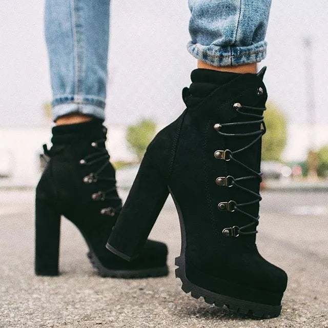 Women's suede ankle boots with a thick high heel in army green, shown from the side.