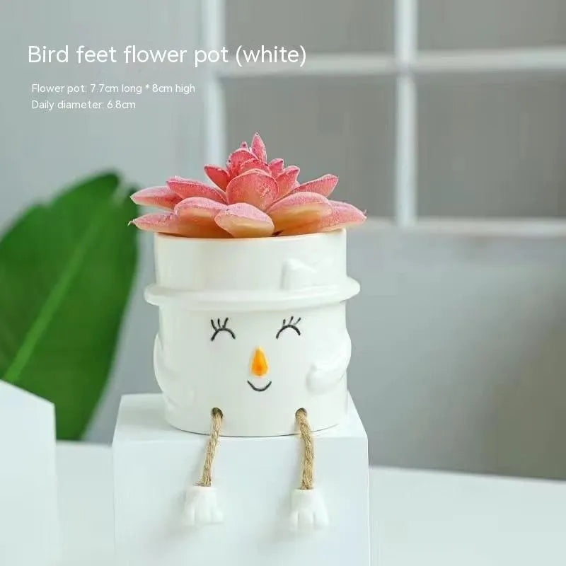 Ceramic hanging foot flowerpot with cartoon design in one of twelve colour variants for succulent plants