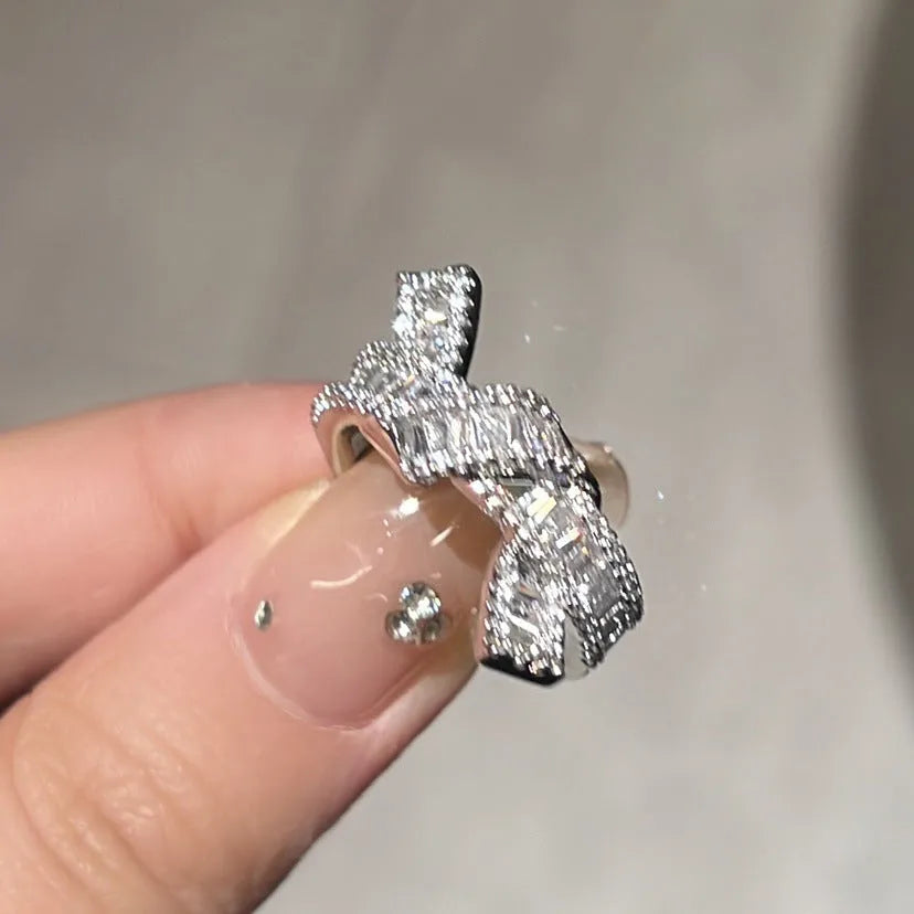 Silver cross open ring with bow shape, copper base, electroplated finish, light luxury style