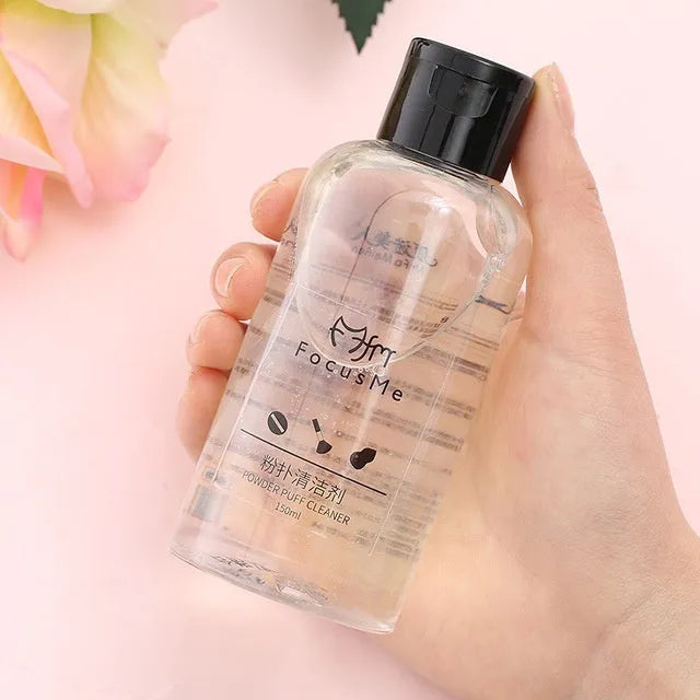 50ml makeup brush cleaning liquid in a clear plastic bottle with blue cap, 9x3x3cm size