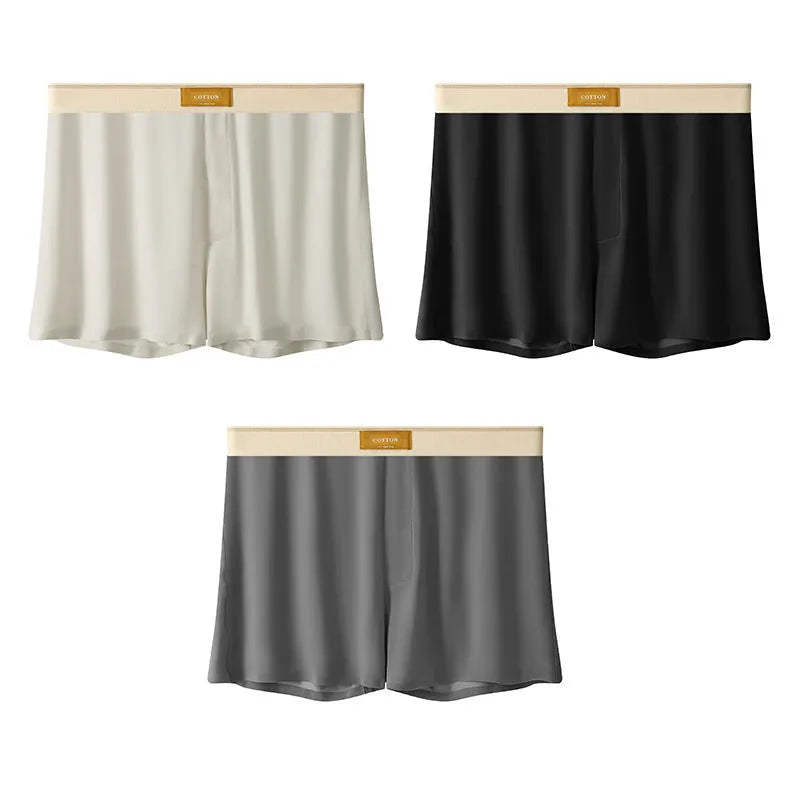 Men's solid colour loose Ice Silk underwear briefs on a neutral background
